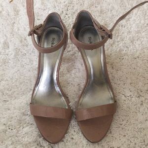 Pair of nude heels